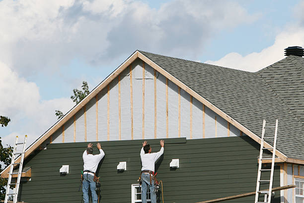 Professional Siding Replacement technician working in Framingham, MA